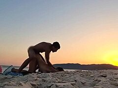 Amateur Couple's Romantic Beach Encounter at sunset