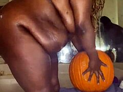 Solo Halloween fun with a hot black babe and her big boobs