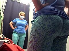 Amateur's dressing room encounter with curvy MILF in tight pants