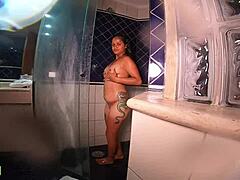 Amateur Brazilian beauty Aline Cassia shows off her natural tits in the shower