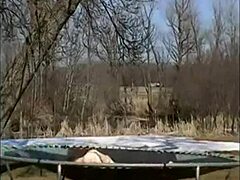 Amateur couple enjoys outdoor trampoline sex