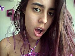 Sexy 18-year-old Colombian girl shows off her tongue on webcam